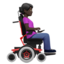Woman In Motorized Wheelchair Facing Right, Dark skin tone