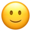 Slightly Smiling Face emoji on iPhone