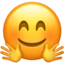 Smiling Face with Open Hands emoji, Apple design