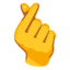 Hand with Index Finger and Thumb Crossed emoji on Android