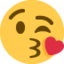 Face Blowing a Kiss on Twitter / X
