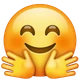 Smiling Face with Open Hands emoji, WhatsApp design