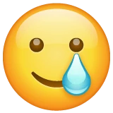Smiling Face with Tear emoji on WhatsApp