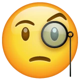 Face with Monocle emoji on WhatsApp